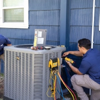 hvac tec working on unit