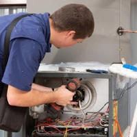 tech working on heating