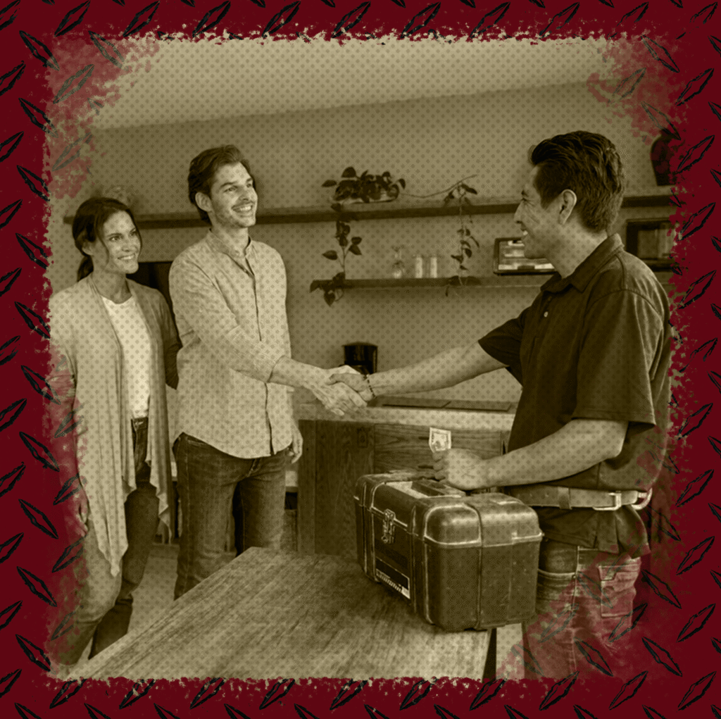 Plumber greeting home owners